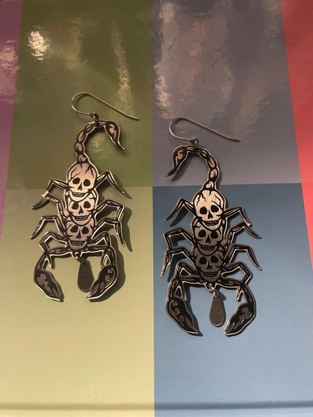 While Odin sleeps silver scorpion skull dangle earrings